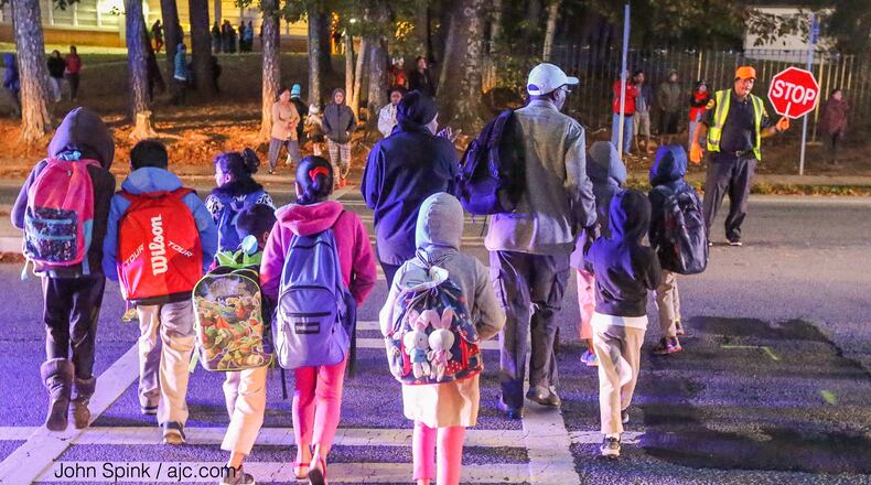 Children crossed a road where a 4-year-old girl was killed in a hit-and-run in DeKalb County.