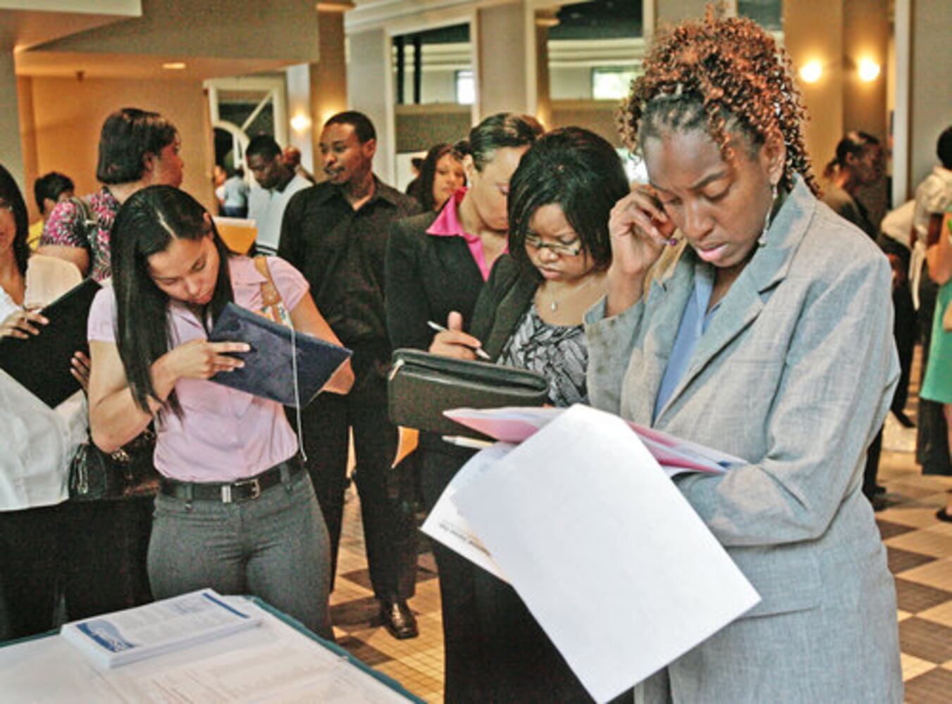 Job fair crowded as unemployment rises
