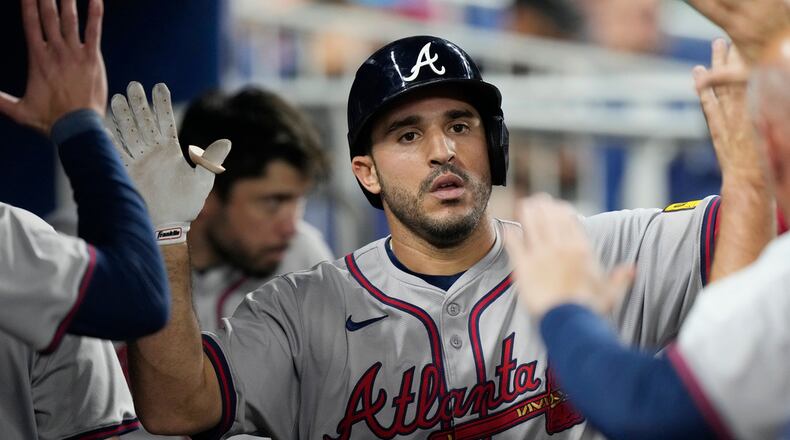 Atlanta Braves' Ramón Laureano celebrates a home run during the sixth inning of a baseball game against the Miami Marlins, Friday, Sept. 20, 2024, in Miami. (AP Photo/Marta Lavandier)