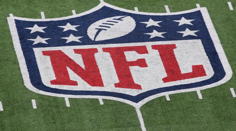 A detail of the official National Football League NFL logo is seen painted on the turf as the New York Giants host the Atlanta Falcons during their NFC Wild Card Playoff game at MetLife Stadium on Jan. 8, 2012 in East Rutherford, New Jersey.  (Nick Laham/Getty Images/TNS)