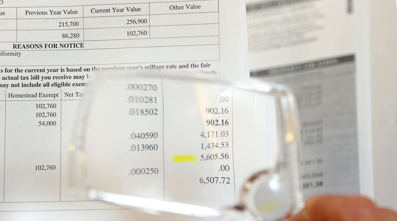 Property values continue to rise across metro Atlanta, but homeowners can fight back if the government’s assessment is too high. They can appeal and potentially save hundreds of dollars on their property taxes. JASON GETZ / AJC