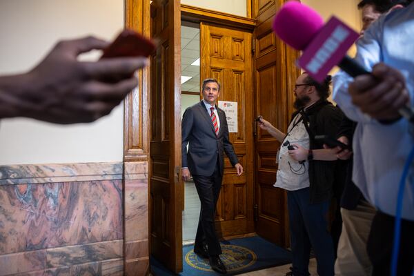 Republican candidate for U.S. Senate Derek Dooley speaks to reporters after filing paperwork to run for election at the Capitol in March. (Arvin Temkar/AJC)