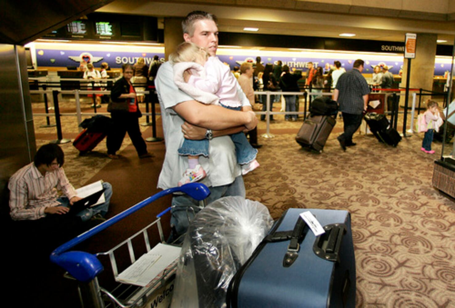 It's busy everywhere: Scenes from the nation's airports