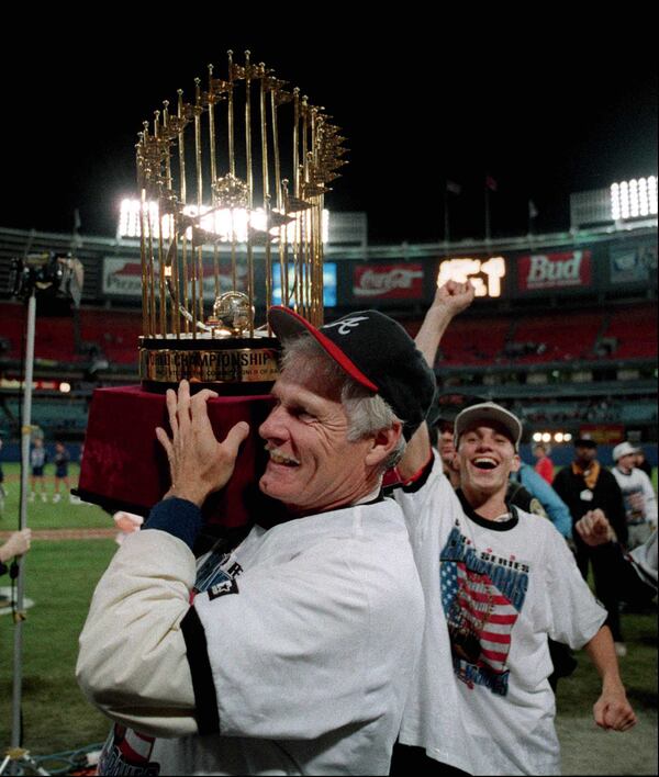 OCTOBER 28, 1995 ATLANTA Braves owner Ted Turner parades around the infield with the World Series Trophy. (AJC photo/Frank Niemeir) 10/95