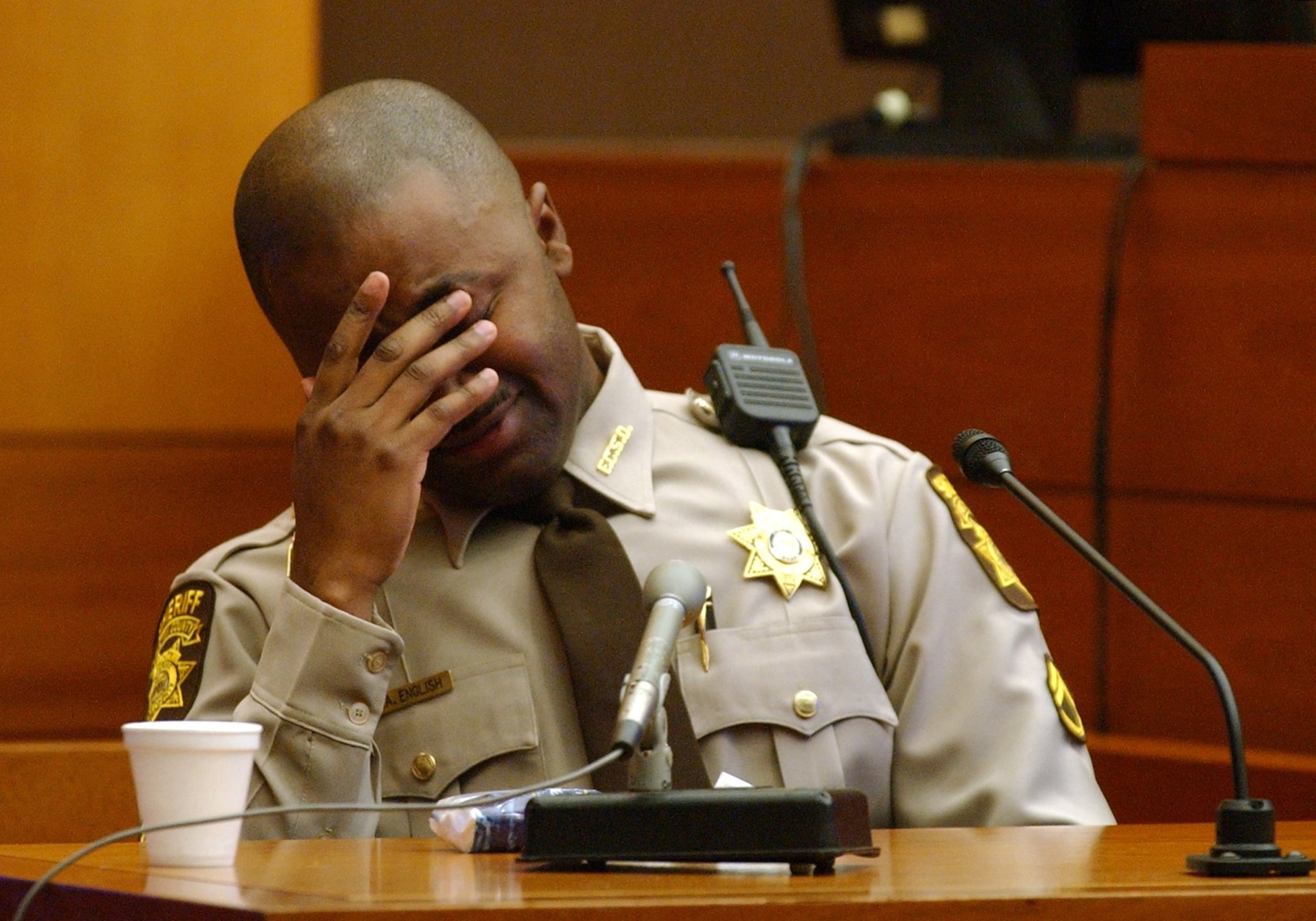 Fulton County Sheriff’s Deputy Aldranon English breaks down as he recalls being shot when he and partner Richard Kinchen went out to serve a warrant on Jamil Abdullah Al-Amin on March 16, 2000. Photographed in Fulton Superior Court in downtown Atlanta on Feb. 19, 2002. (Bita Honarvar/AJC)