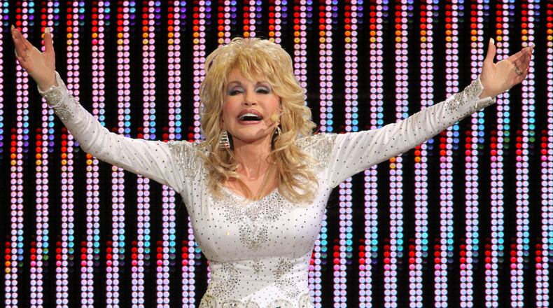 Dolly Parton, who performed in Gwinnett earlier this year, is holding a star-studded telethon for wildfire victims. Photo: Robb D. Cohen / www.robbsphotos.com