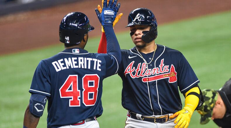Atlanta's William Contreras (right) had been training in the outfield, but the Braves hadn’t trusted him in game action until Monday. Contreras was scheduled to start in left field for the series opener against the Phillies. (AP Photo/Gaston De Cardenas)