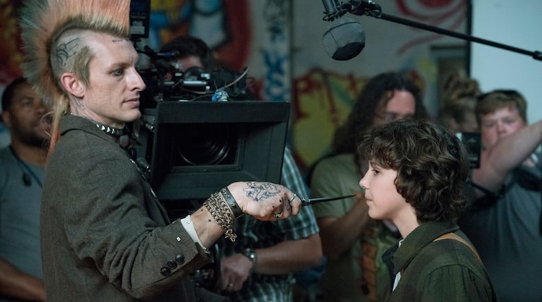 Millie Bobby Brown (right) behind the scenes shooting Netflix's "Stranger Things." NETFLIX