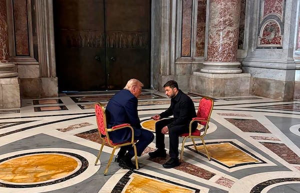 In this photo provided by the Ukrainian Presidential Press Office, Ukraine's President Volodymyr Zelenskyy, right, and President Donald Trump, talk as they attend the funeral of Pope Francis in Vatican, Saturday, April 26, 2025.(Ukrainian Presidential Press Office via AP)