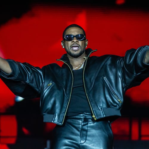 Atlanta singer Usher performs at Piedmont Park in October. He is suing music producer Bryan-Michael Cox and others over a failed Buckhead restaurant deal. (Ryan Fleisher for the AJC)