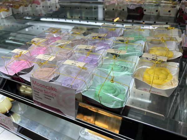 Colorful snowskin mooncakes in lychee, chocolate, mango and other flavors displayed at Sweet Hut Bakery in Kennesaw