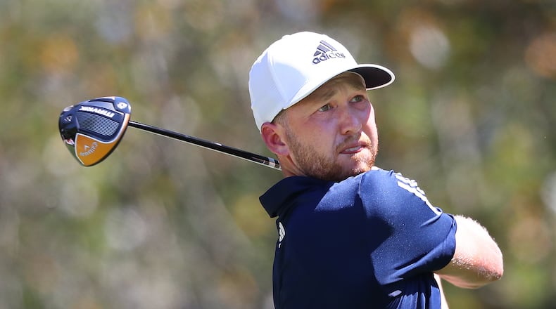 Daniel Berger lets it rip off the tee on the fifth hole during the final round of the Tour Championship at East Lake Golf Club on Monday.  Curtis Compton / Curtis.Compton@ajc.com