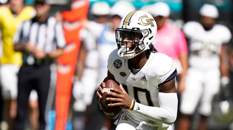 Georgia Tech quarterback Jeff Sims looks for to pass during the first half of an NCAA college football game against Miami, Saturday, Nov. 6, 2021, in Miami Gardens, Fla. (AP Photo/Wilfredo Lee)