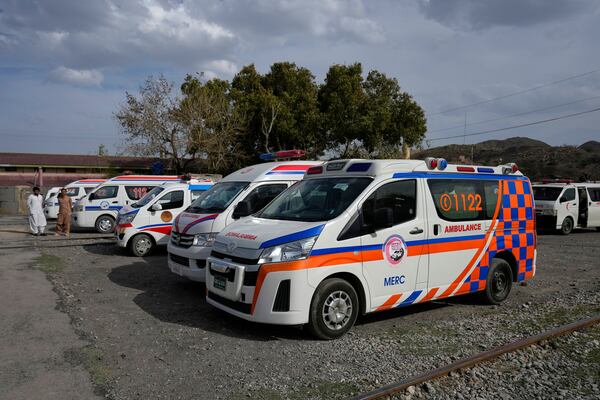 Ambulances park outside a railway station where rescued and injured passenger of a train attacked by insurgents are brought in Much, Pakistan's southwestern Balochistan province, Wednesday, March 12, 2025. (AP Photo/Anjum Naveed)