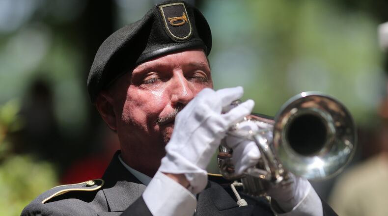 Rafael Picklesimer plays taps to close a Roswell Remembers Memorial Day celebration in this 2016 file photo.