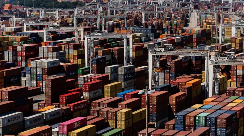 Shipping containers at the Port of Savannah, which has been running out of places to put a pileup of nearly 80,000 of them. The White House announced Tuesday that money from the infrastructure bill will help set up in-door yards to take many of those containers and alleviate the crush . (Erin Schaff/The New York Times)