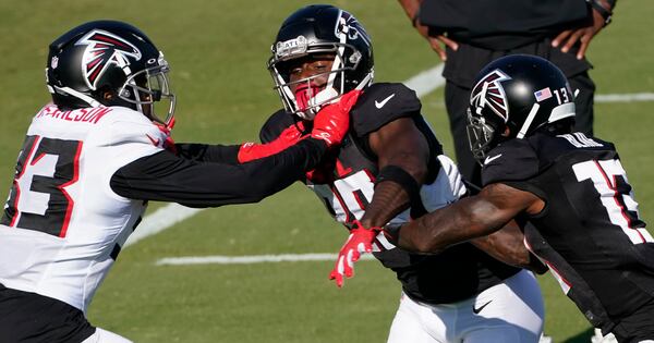Atlanta Falcons wide receiver Russell Gage (83) works with Jordan Miller (28) and Atlanta Falcons wide receiver Christian Blake (13) during an NFL football practice Tuesday, Aug. 18, 2020, in Flowery Branch, Ga. (AP Photo/John Bazemore, Pool)