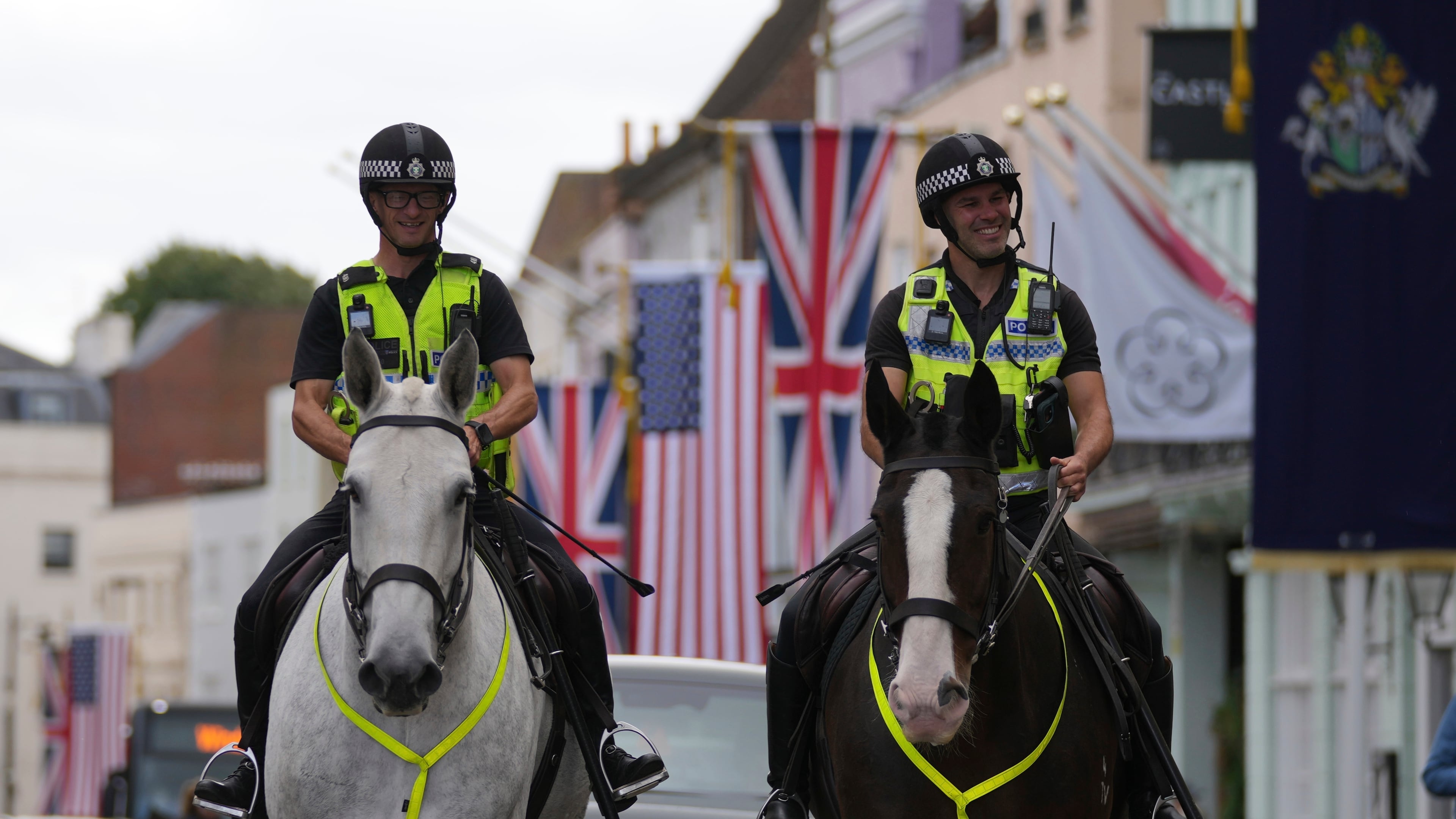 Police officers patrol outside the Windsor Castle in Windsor, England, Monday, Sept. 15, 2025, ahead of the state visit of U.S. President Donald Trump. (AP Photo/Kin Cheung)