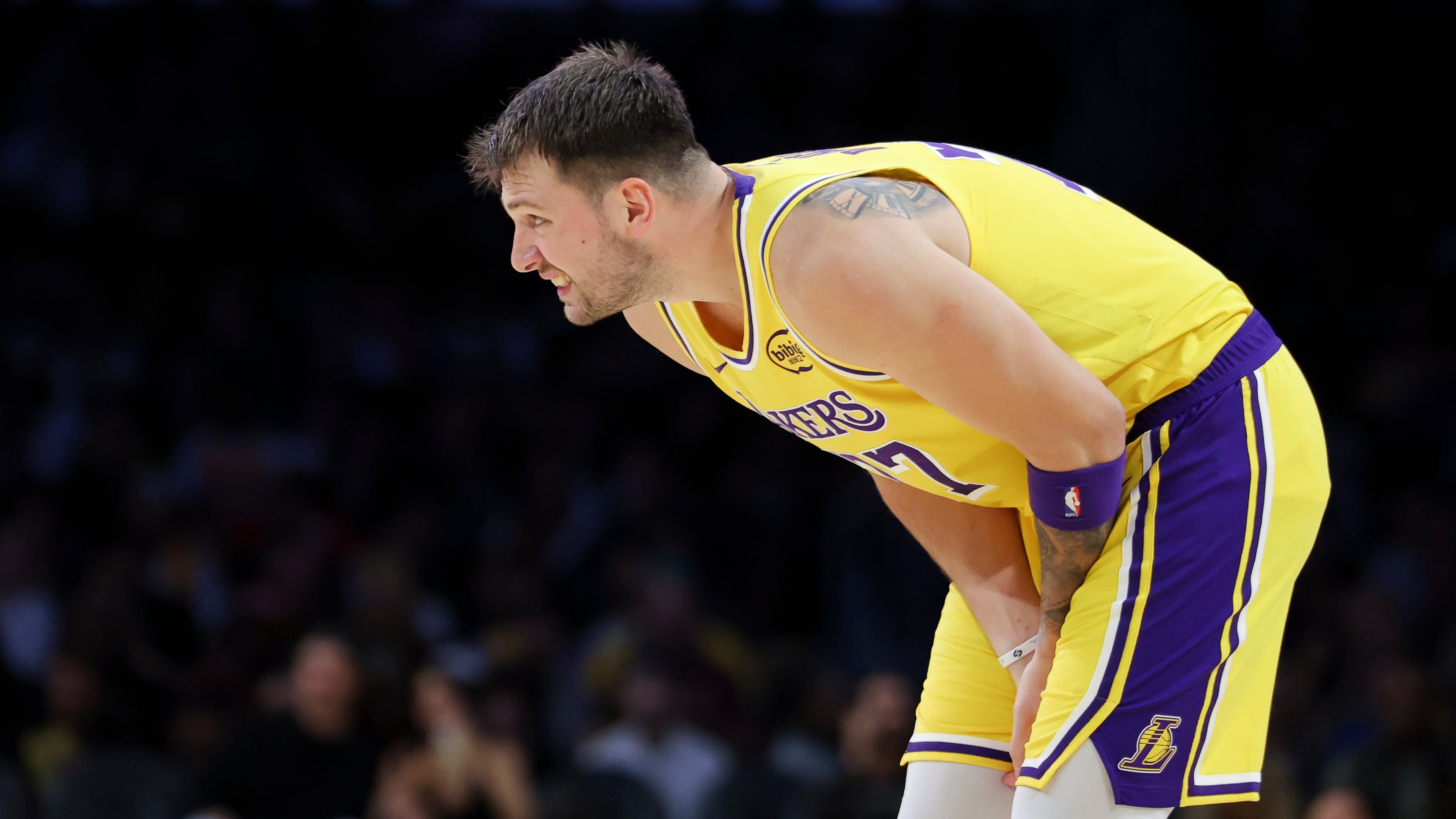 Los Angeles Lakers guard Luka Doncic reacts during the first half of an NBA basketball game against the Minnesota Timberwolves, Friday, Oct. 24, 2025, in Los Angeles. (AP Photo/Jessie Alcheh)