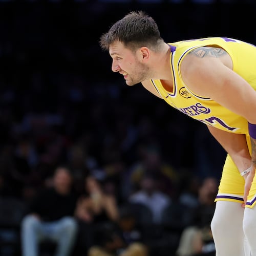Los Angeles Lakers guard Luka Doncic reacts during the first half of an NBA basketball game against the Minnesota Timberwolves, Friday, Oct. 24, 2025, in Los Angeles. (AP Photo/Jessie Alcheh)
