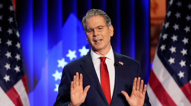 Scott Bessent, US Secretary of the Treasury, holds a speech at the USA House during the Annual Meeting of the World Economic Forum in Davos, Switzerland, Tuesday, Jan. 20, 2026. (AP Photo/Markus Schreiber)