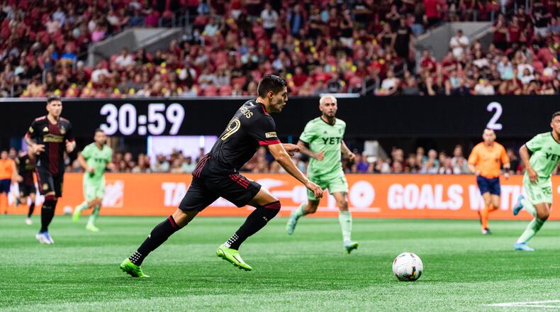 Atlanta United forward Ronaldo Cisneros #29 dribbles the ball during the first half of the match against Austin FC at Mercedes-Benz Stadium in Atlanta, United States on Saturday July 9, 2022. (Photo by Dakota Williams/Atlanta United)