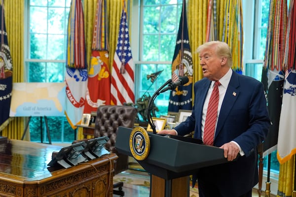 President Donald Trump speaks to reporters after David Perdue was sworn in as U.S. Ambassador to China during a ceremony in the Oval Office of the White House, Wednesday, May 7, 2025, in Washington. (AP Photo/Mark Schiefelbein)