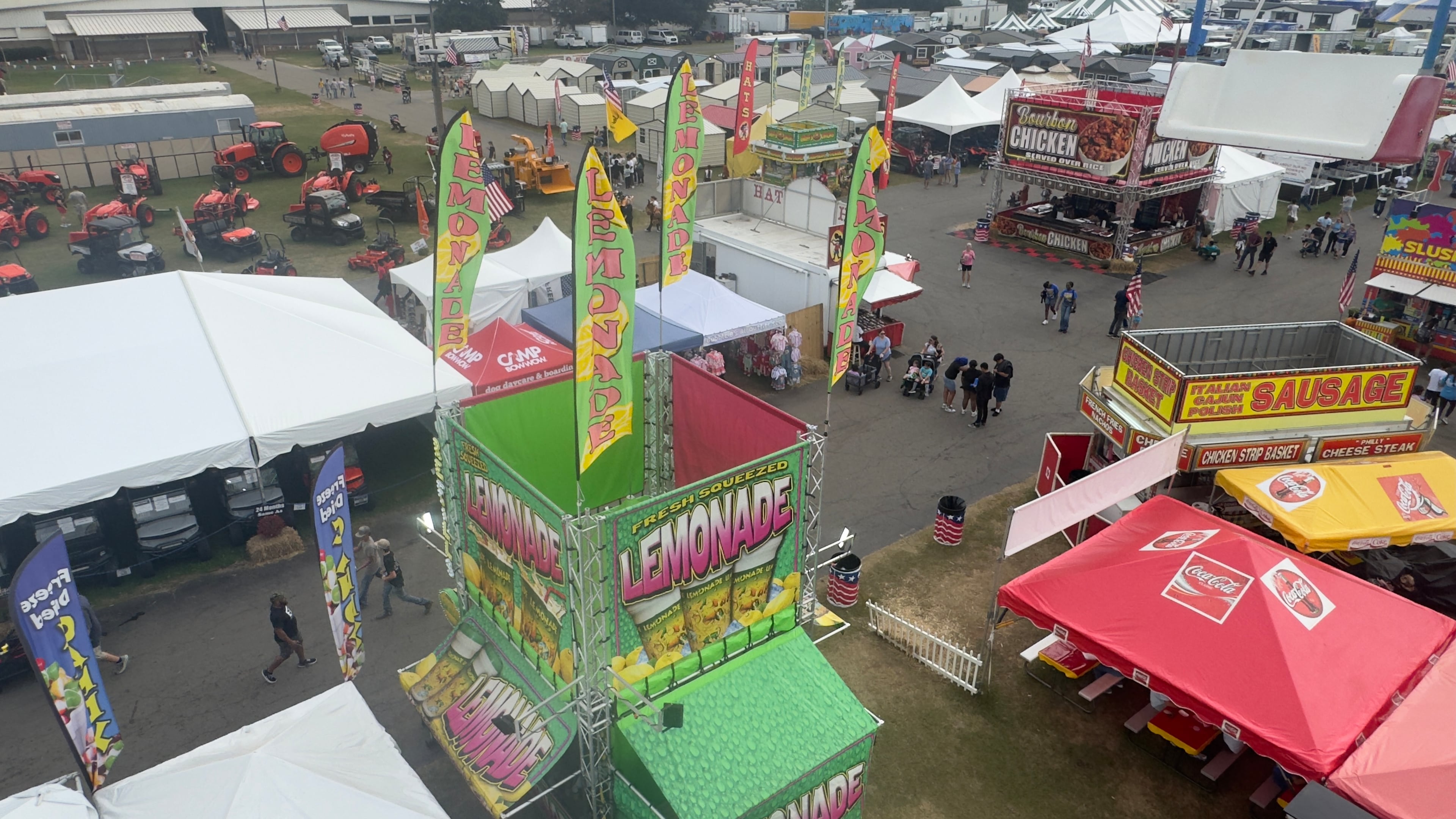 An aerial view from aboard the Georgia National Fair's Agri-Lift affords views of all manner of eating emporiums, and a glut of lemonade huts. (Joe Kovac Jr./AJC)