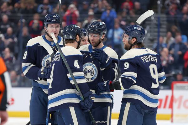 Columbus Blue Jackets center Adam Fantilli (19) celebrates his goal with center Cole Sillinger (4) and defenseman Ivan Provorov (9) during the second period of an NHL hockey game against the Washington Capitals, Saturday, April 12, 2025, in Columbus, Ohio. (AP Photo/Joe Maiorana)