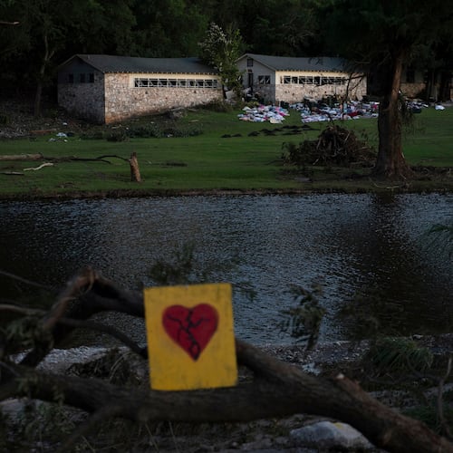 FILE - A broken heart sign is displayed near Camp Mystic on Tuesday, July 8, 2025, after a flash flood swept through the area in Hunt, Texas. (AP Photo/Eli Hartman, file)