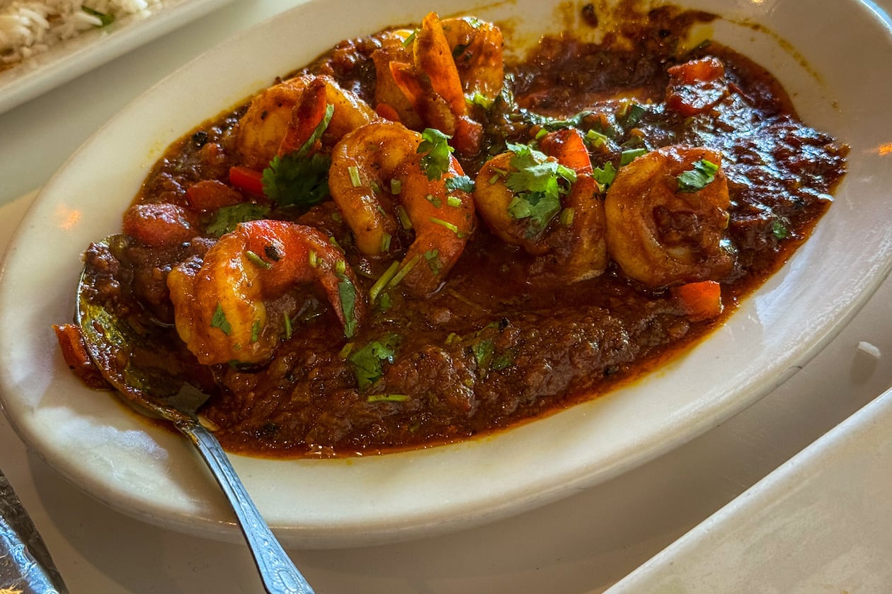 The bhagari shrimp at Ruchi Bangladeshi Cuisine were plump, properly cooked and served in a comforting tomato sauce. (Henri Hollis/AJC)