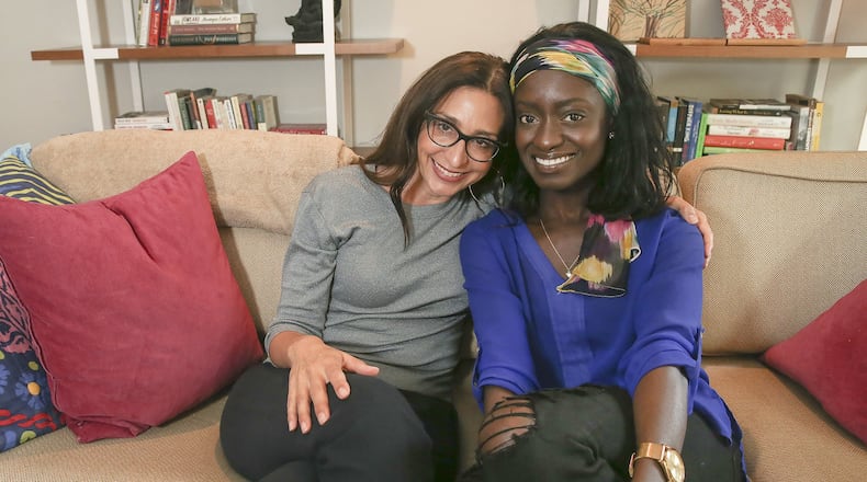 Melissa DePino (left) and Michelle Saahene have created From Privilege to Progress, a campaign to get white people to share the experiences of people of color on their social networks. STEVEN M. FALK / PHILADELPHIA INQUIRER / TNS