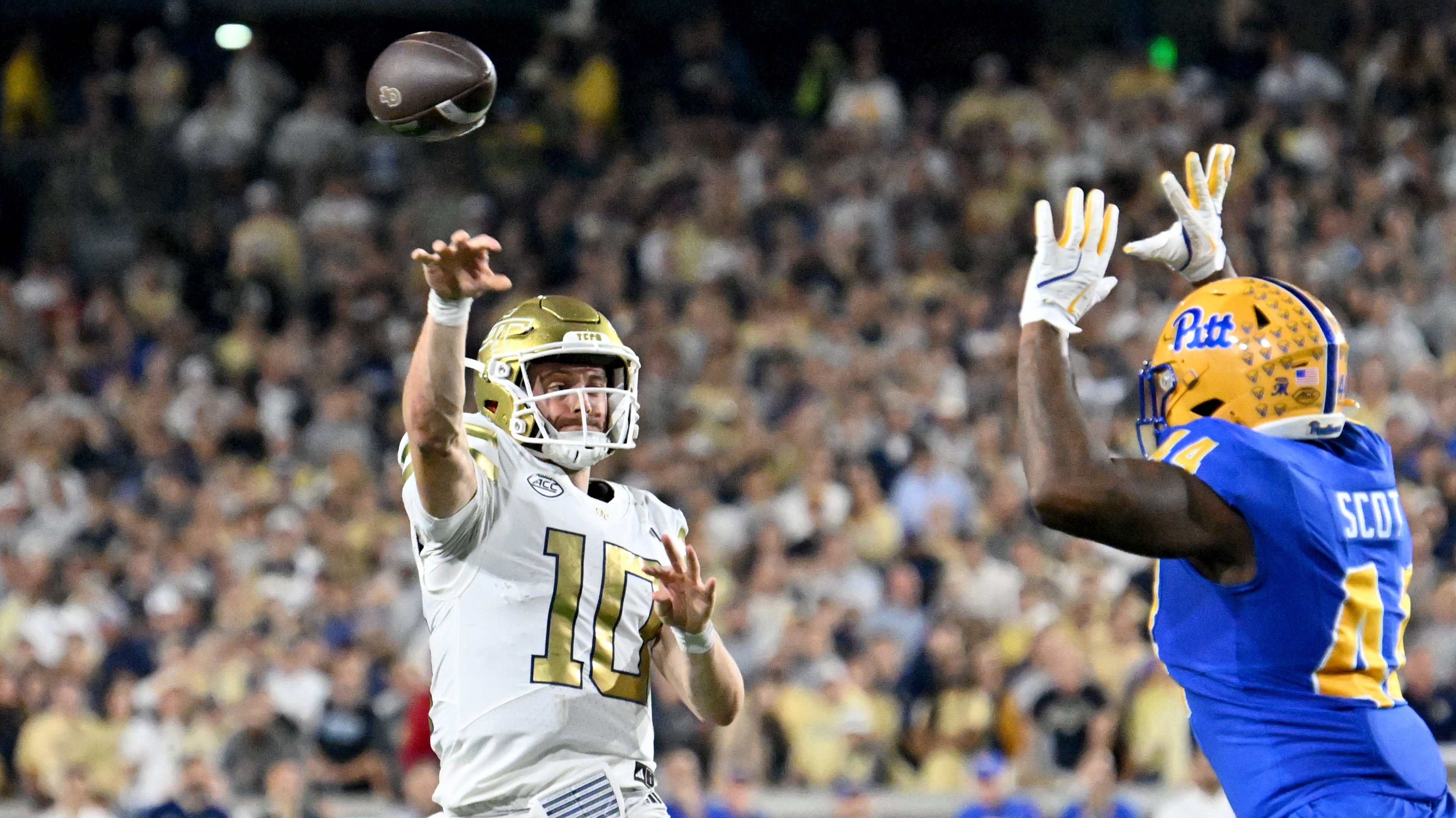 Georgia Tech quarterback Haynes King (10) gets off a pass during the first half in an NCAA college football game at Bobby Dodd Stadium, Saturday, November 22, 2025 in Atlanta. (Hyosub Shin / AJC)