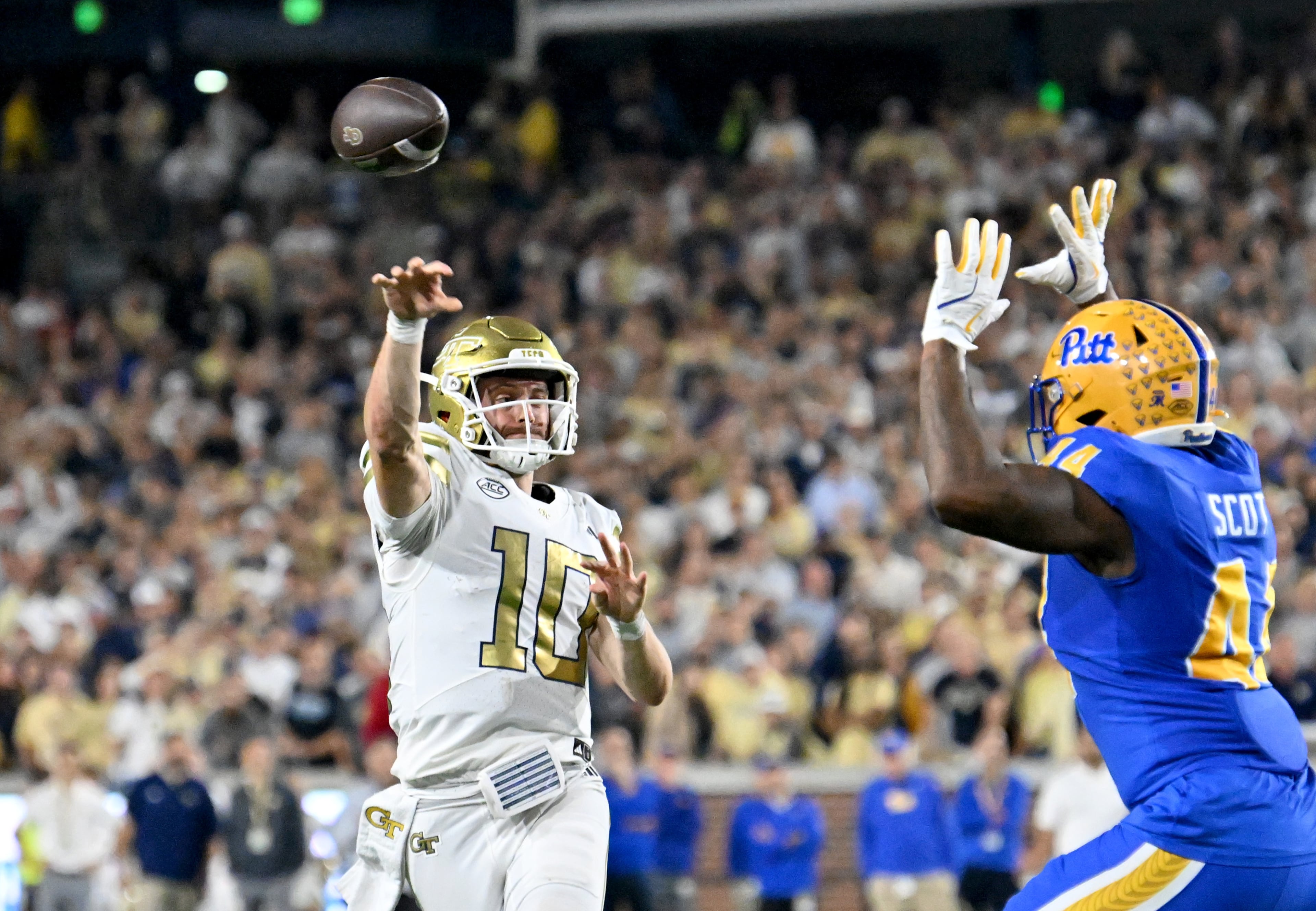 Georgia Tech quarterback Haynes King (10) gets off a pass during the first half in an NCAA college football game at Bobby Dodd Stadium, Saturday, November 22, 2025 in Atlanta. (Hyosub Shin / AJC)