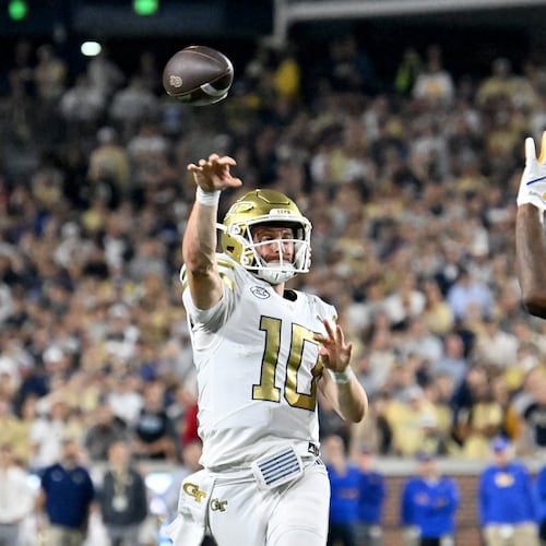Georgia Tech quarterback Haynes King (10) gets off a pass during the first half in an NCAA college football game at Bobby Dodd Stadium, Saturday, November 22, 2025 in Atlanta. (Hyosub Shin / AJC)