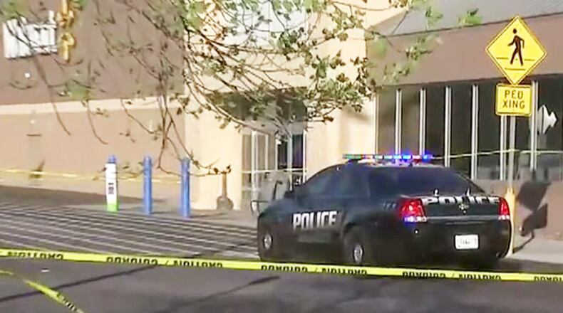 DeKalb County police say they are investigating after a suspected shoplifter shot a guard at Wal-Mart near Lithonia.