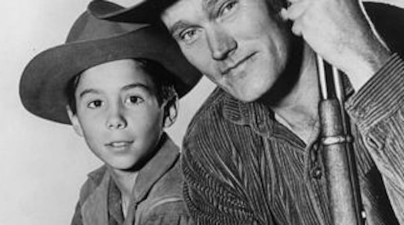 Johnny Crawford and Chuck Connors in "The Rifleman." Crawford, known for playing the young son of Connors on the ABC series “The Rifleman” from 1958 to ’63, has died. The actor was 75.