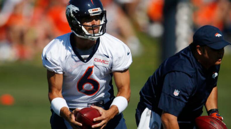 Denver Broncos quarterback Mark Sanchez takes part in drills during the team's NFL football practice Monday, Aug. 8, 2016 in Englewood, Colo. (AP Photo/David Zalubowski)