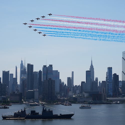 Military planes perform a flyover of the Hudson River, above the the Manhattan skyline, as seen from Weehawken, N.J., Saturday, July 4, 2026. (AP Photo/Seth Wenig)