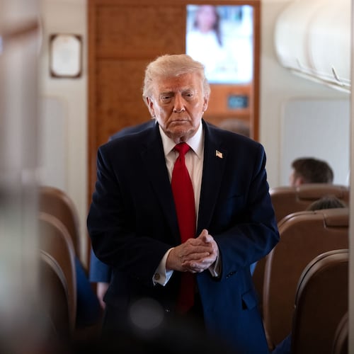 President Donald Trump arrives to speak to reporters aboard Air Force One en route from Joint Base Andrews, Md., to Eau Claire, Wis., Friday, June 5, 2026. (AP Photo/Mark Schiefelbein)