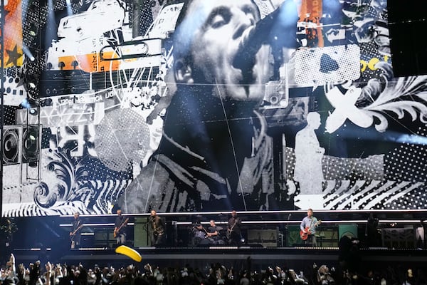 Oasis perform during their reunion concert on Friday, July 4, 2025, in Cardiff. (Photo by Scott A Garfitt/Invision/AP)