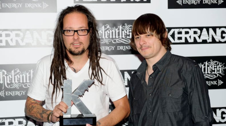 Jonathan Davis of Korn (left) poses with the Hall of Fame Award.