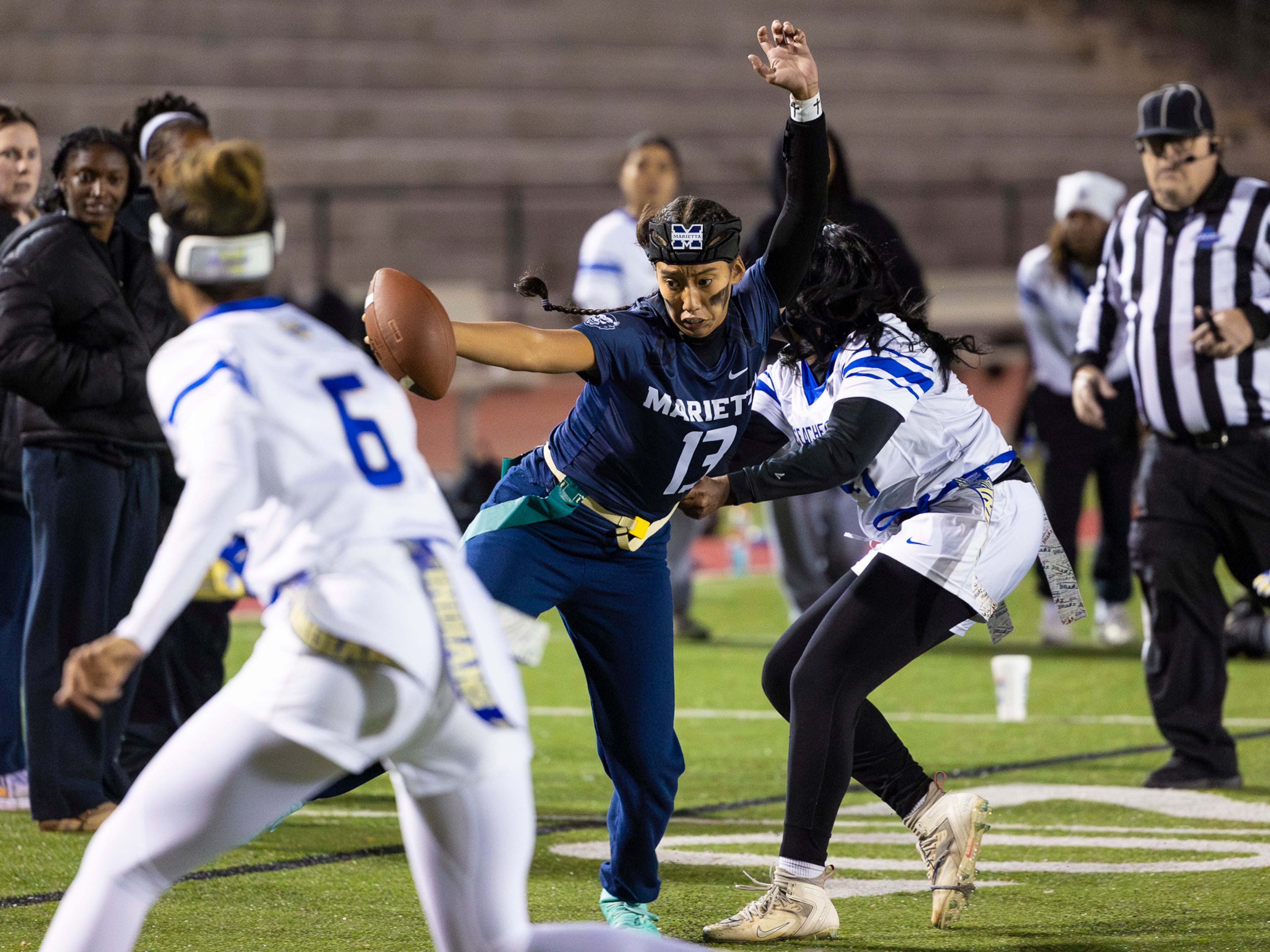 Marietta's Kaylee Wang (13) gets her flag pulled in a flag football game against McEachern at Osborne High School in Marietta, GA on Monday, November 17th, 2025. (Oscar Guevara Saenz for the AJC)