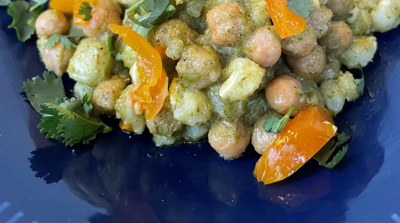 Leon's Full Service's Warm Hominy and Feta Salad. (Courtesy of Jeff Sellers)