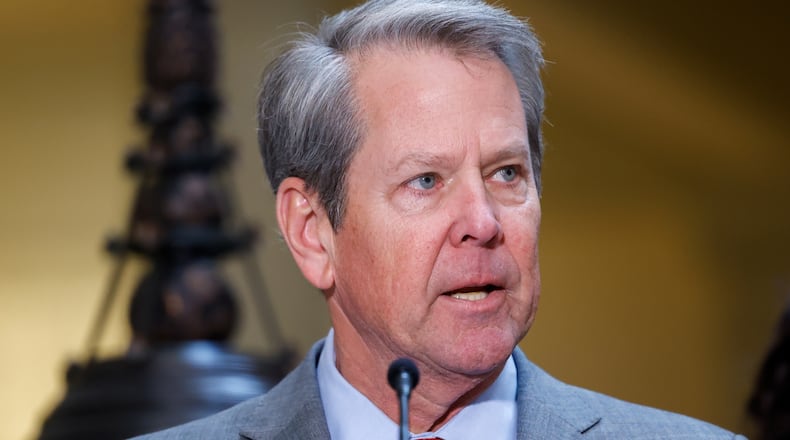 Gov. Brian Kemp at a news conference in March. (Arvin Temkar/AJC)