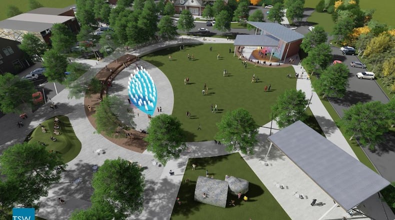 Powder Springs is proceeding with its new downtown park with the demolition of a former commercial building on April 17. Courtesy of Powder Springs