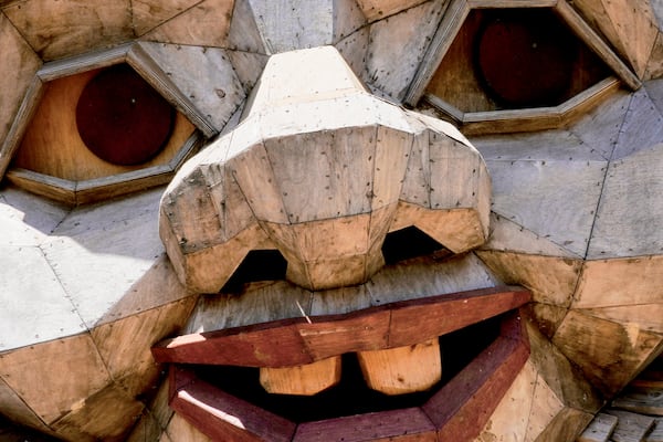 The face of a giant troll sculpture created by the Danish recycle artist Thomas Dambo and his team that's part of an installation of six sculptures called "Trolls Save the Humans" is seen on display at the historic estate Filoli, Saturday, July 5, 2025, in Woodside, Calif. (AP Photo/Terry Chea)
