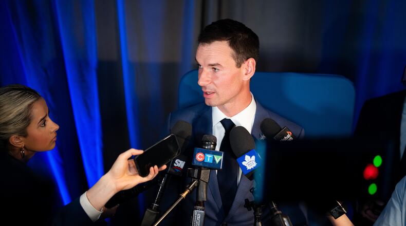 FILE - New Toronto Maple Leafs General Manager John Chayka speaks during a scrum following a news conference in Toronto, May 4, 2026. (Arlyn McAdorey/The Canadian Press via AP, File)