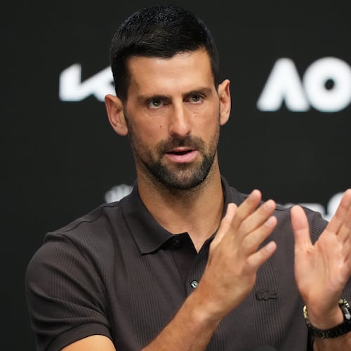 Novak Djokovic of Serbia gestures during a press conference ahead of the Australian Open tennis championship in Melbourne, Australia, Saturday, Jan. 17, 2026. (AP Photo/Aaron Favila)