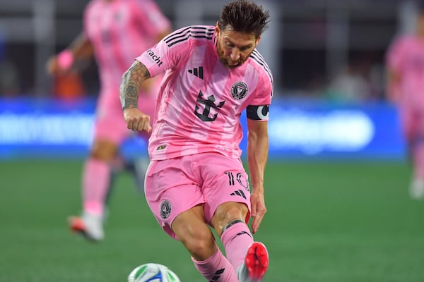 Inter Miami forward Lionel Messi kicks the ball into the net to score during the first half of an MLS soccer match against the New England Revolution, Wednesday, July 9, 2025, in Foxborough, Mass. (AP Photo/Steven Senne)